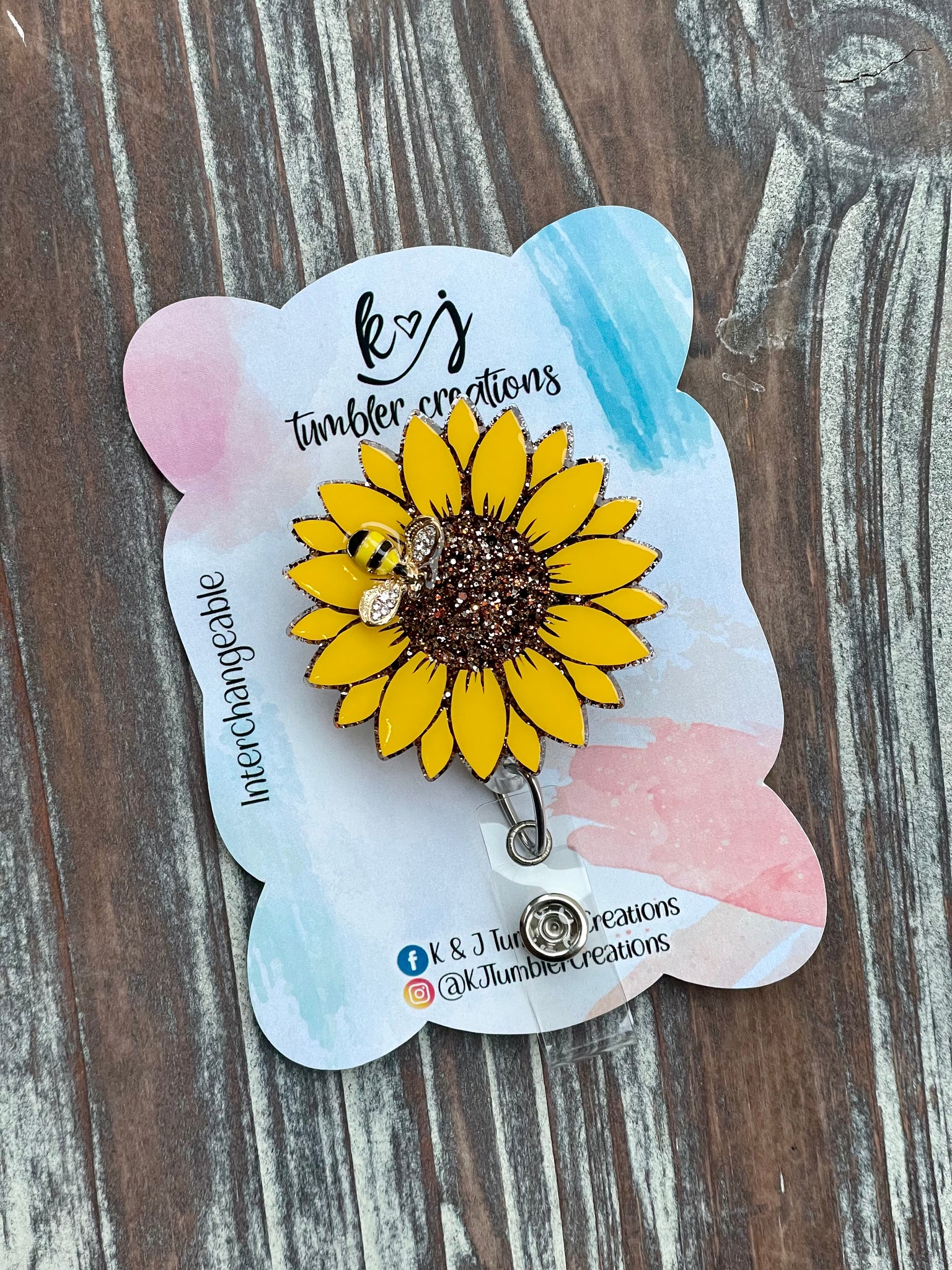 Smiling sunflower badge holder with retractable reel